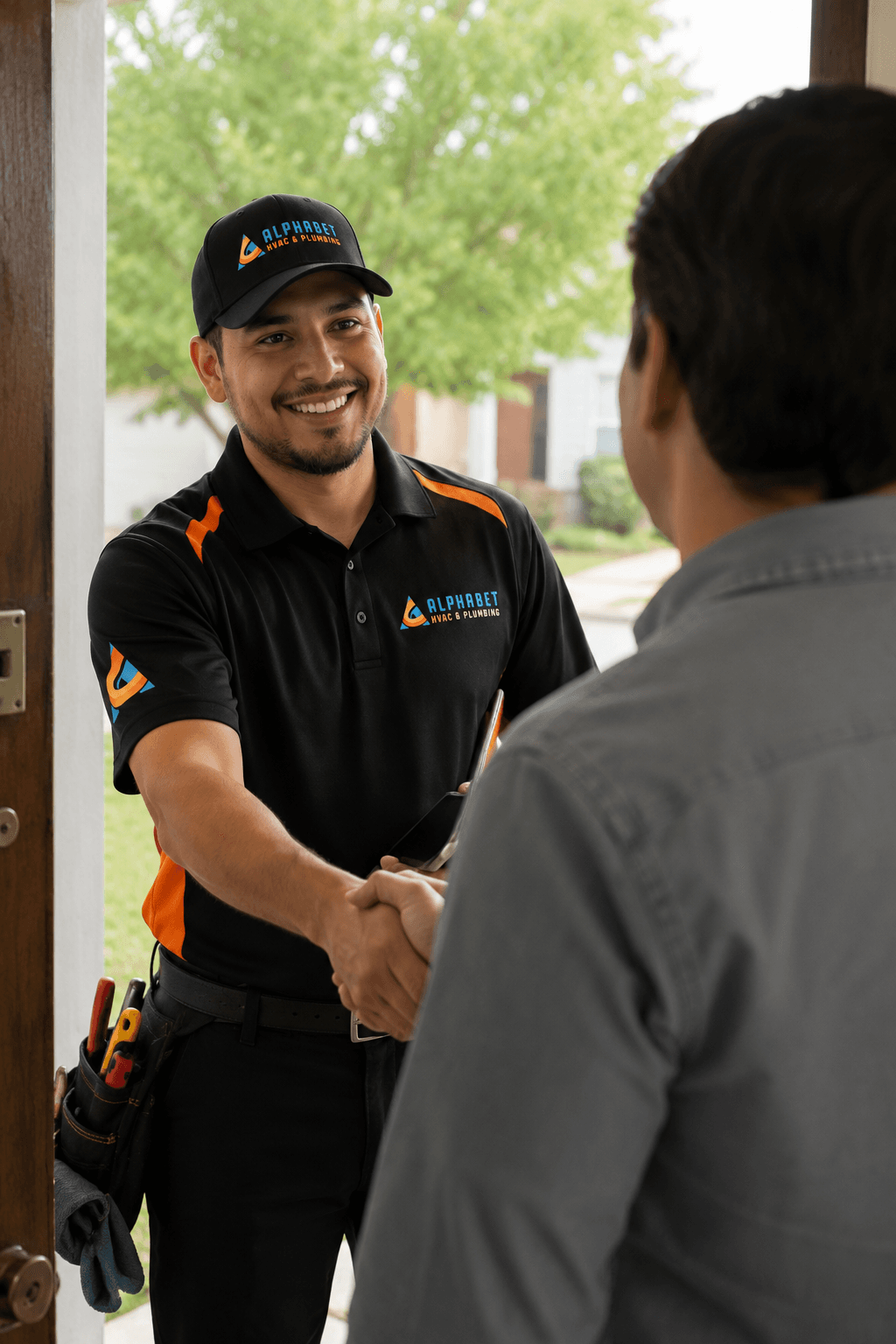 Alphabet technician greeting a homeowner